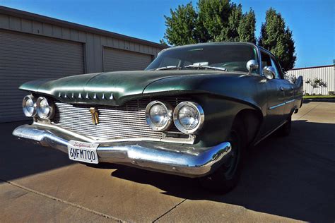 Finned 4 Door: 1960 Plymouth Savoy