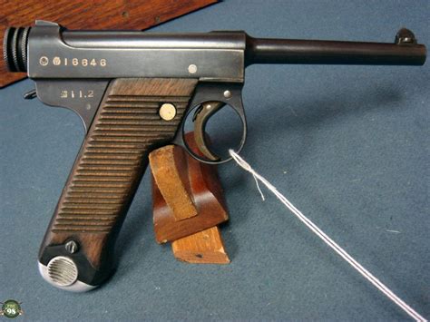 SOLD JAPANESE TYPE 14 NAMBU PISTOL....NAGOYA NAMBU FEB, 1936 PRODUCTION....... STILL WITH THE ...