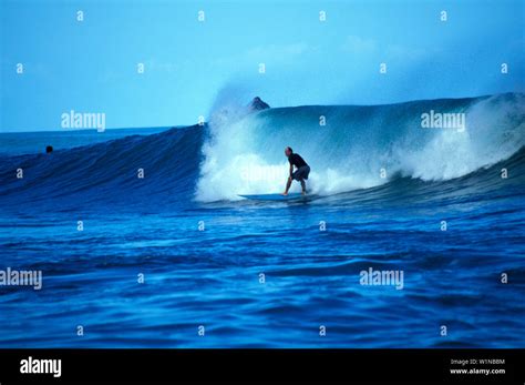 Surfing at the beach of Puerto Viejo, Puerto Viejo, Costa Rica ...