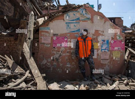 Kathmandu, Nepal. 3rd May, 2015. A Nepalese Army rescue team is watching the collapsed and ...