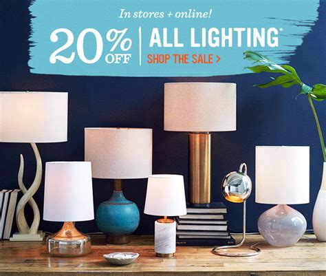 a table topped with lots of lamps next to a wall mounted sign that says 20 % off all lighting ...