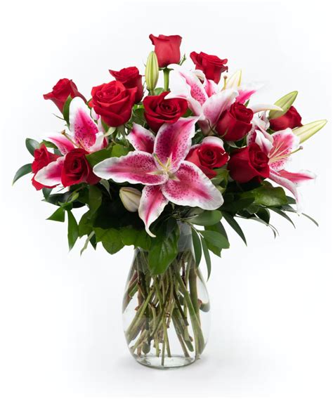 Roses and lilies by Eastern Floral - Flower Delivery Grand Rapids, Michigan in 2022 | Flower ...