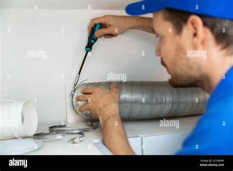 Cooker hood installation hi-res stock photography and images - Alamy