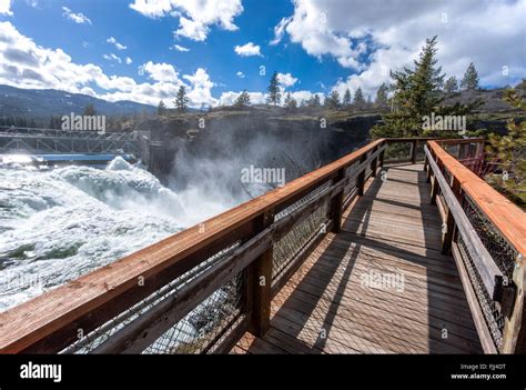 The boardwalk that lets people see the Post Falls Dam in Idaho Stock ...