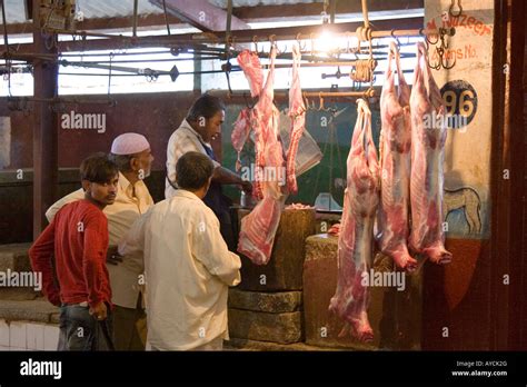 Meat hanging in butcher s shop Russel Market Bangalore Stock Photo - Alamy