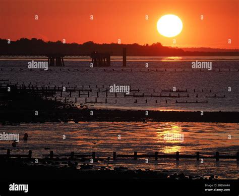 Sheerness, Kent, UK. 20th May, 2023. UK Weather: glowing sunset in ...