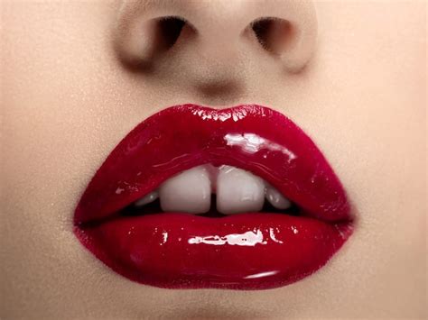 Premium Photo | Close up view of beautiful woman lips with red lipstick ...