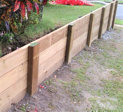 Build an Easy DIY Wood Retaining Wall#build #diy #easy #retaining #wall ...