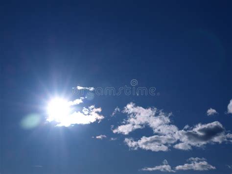 Shining Sun & a Bright Blu Sky Stock Image - Image of clouds, environment: 12788929