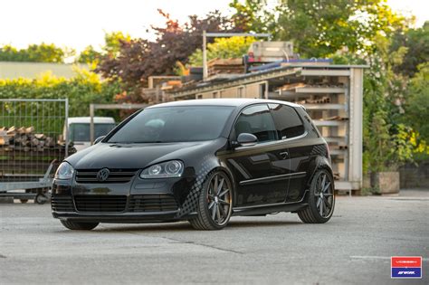 Custom Satin Black Debadged VW Golf Sits Well on Vossen Wheels — CARiD ...