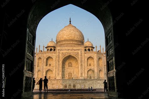 Agra, Delhi, Taj Mahal. Large, open, carved doorway leads to the Taj ...