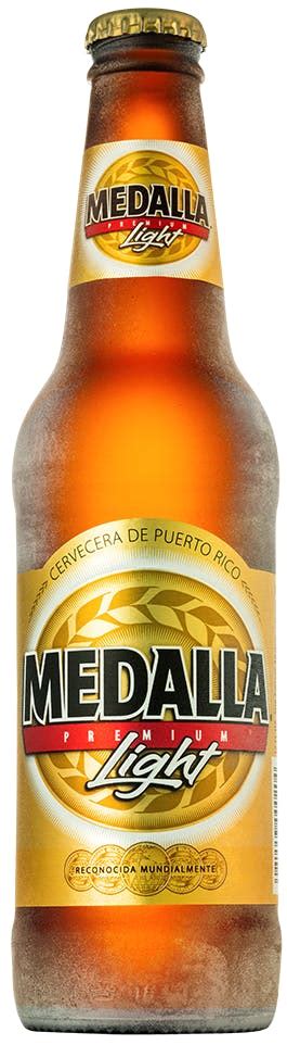 Medalla Light Premium Light 6 pack 12 oz. Bottle - Yankee Spirits