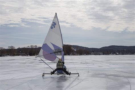 Ice boats are flying across frozen lake in this popular Michigan resort ...