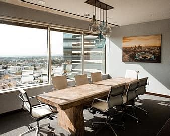 office, person, human, people, company, chair, furniture, indoors, work, table, building | AnyRGB