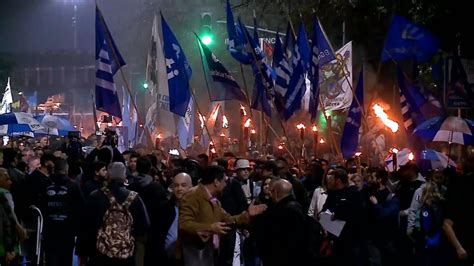 Don't Cry For Me, Argentina - Thousands honour Eva 'Evita' Peron with torch march in Buenos ...