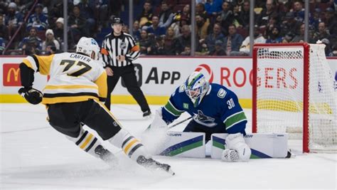 Canucks win second straight, pull away from Penguins