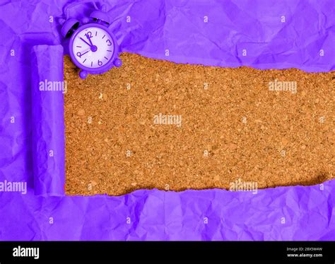 Rolled Ripped Torn Cardboard Placed Above A Wooden Classic Table Backdrop Stock Photo - Alamy