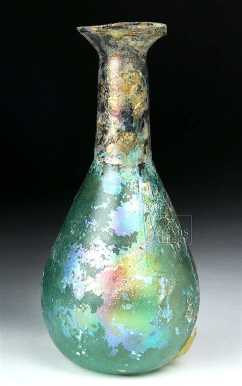 Sold at Auction: Roman Glass Flask - Gorgeous Iridescence | Glass flask, Antique glass bottles ...