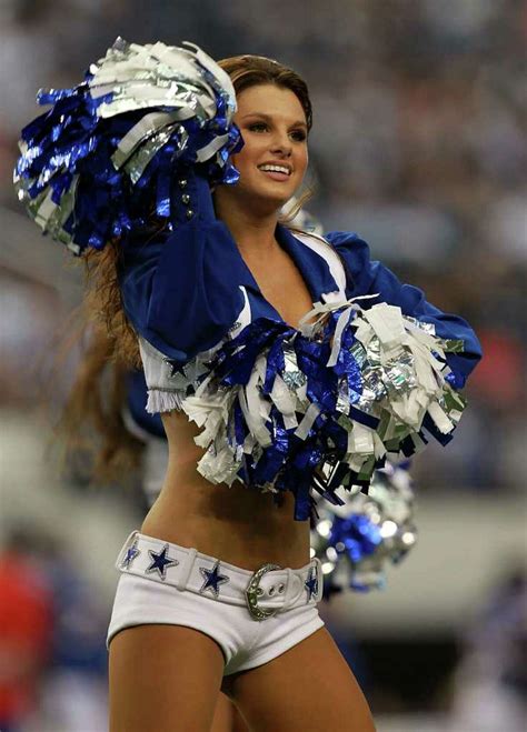 Dallas Cowboys Cheerleaders slip on swimsuits for upcoming calendar photo shoot