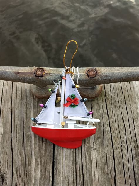 Nautical Sailboat Christmas Ornament with Decorations on Sail