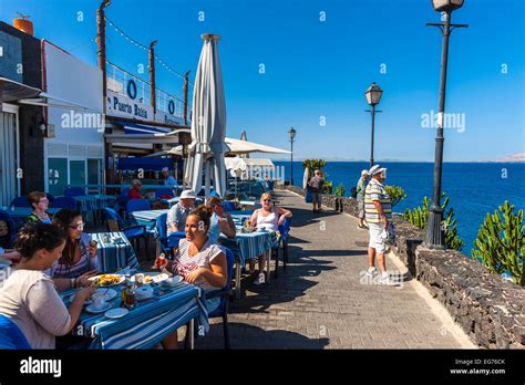 Spain, Canary Islands, Lanzarote, Puerto del Carmen, beach promenade ...