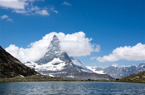 Matterhorn, Valais, Switzerland Stock Image - Image of clouds, rock ...