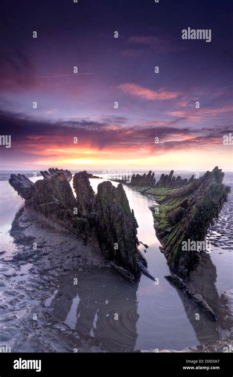 Wreck of the Norwegian trawler S.S. Nornen at sunset on Berrow Beach near Burnham-on-Sea ...