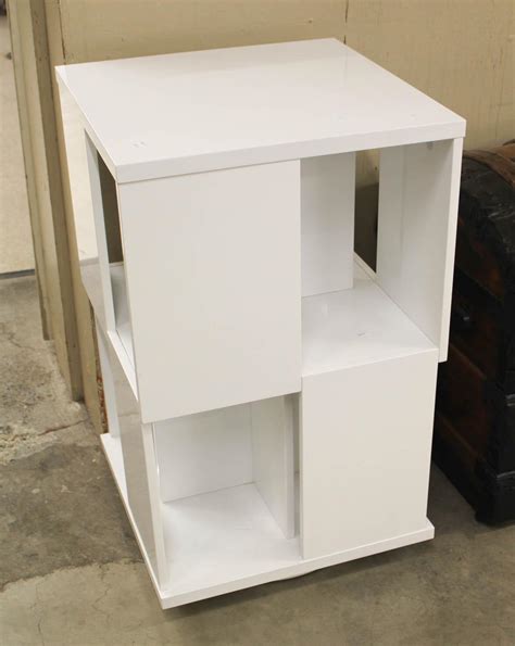 Lot - WHITE REVOLVING BOOKCASE