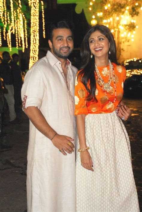 Shilpa Shetty with husband Raj Kundra at their hosted Diwali 2014 party ...