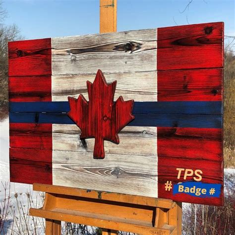 This Canadian Flag made of Burnt Wood, is truly unique. The wooden flag is made of burnt cedar ...