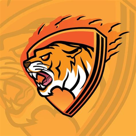 Premium Vector | Tiger Mascot on Fire Ball Logo Design