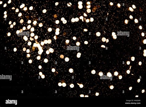 Bokeh's and raindrops on window with black background Stock Photo - Alamy