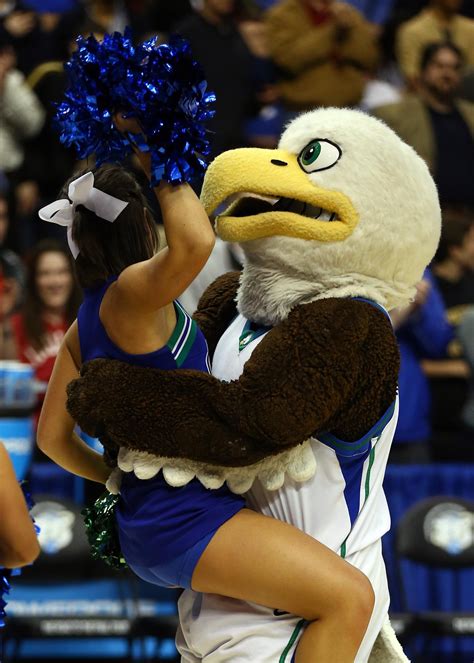 messing around with the mascot : r/cheerleaders