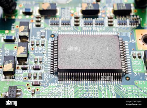 Cpu and resistors on computer circuit board, motherboard Stock Photo - Alamy