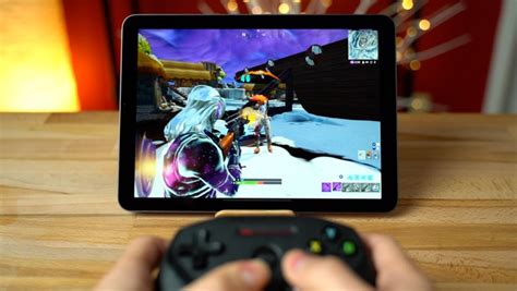 Playing 'Fortnite' on an iPad Pro and iPhone XR with a controller is a considerable improvement