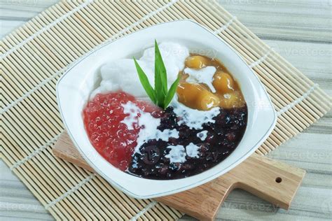 Bubur Sumsum Ketan Hitam or Black Sticky Rice Multi Cereal Porridge 44028838 Stock Photo at Vecteezy