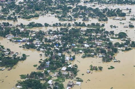 Assam floods: 12 more killed, 54L people hit; water recedes in some areas - Rediff.com India News