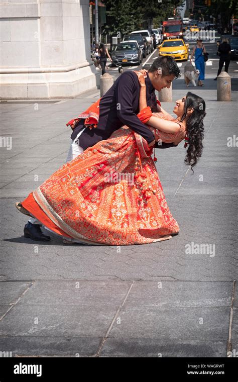 Romantic couple posing in city park hi-res stock photography and images - Alamy