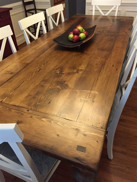 Reclaimed wood dining table with a 2" thick plank top, breadboards, and custom turned legs ...