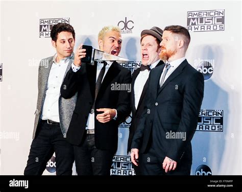 Los Angeles, USA. 22nd Nov, 2015. Fall Out Boy pose with their award ...