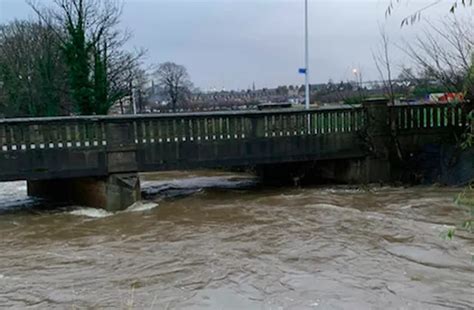 Edinburgh flooding: Anxious local residents share fears as Water of Leith rises above trees ...