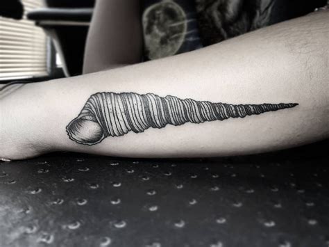 Conch shell tattoo by Tarita Aurora. Shell tattoos are very especial ...