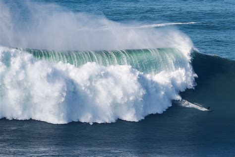 Hurricane-generated swell draws big wave surfers to Portugal's Nazare ...