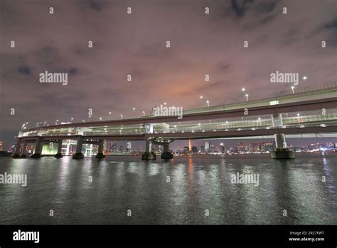 The night view of Odaiba Rainbow Bridge Stock Photo - Alamy