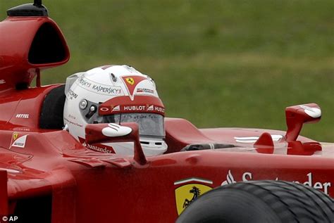 Sebastian Vettel wears 'my first day at Ferrari' helmet during test ...