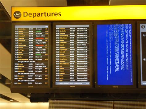 Departure board blue screen of death, Heathrow Terminal 5 - a photo on ...