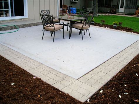 pavers border patio - Google Search | Concrete patio, Patio extension ideas, Patio stones