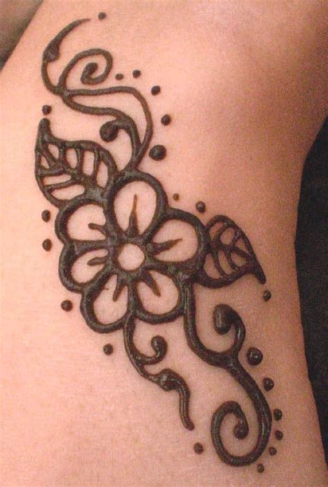 Temporary Tattoos: Henna Ink | Henna flower designs, Simple henna tattoo, Henna tattoo hand