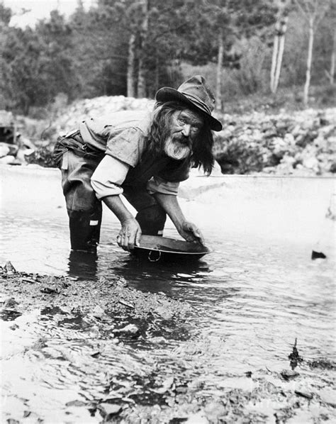 Prospector Panning For Gold by Bettmann