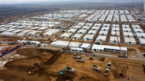 China builds massive Covid-19 quarantine camp for 4,000 people as outbreak continues - CNN